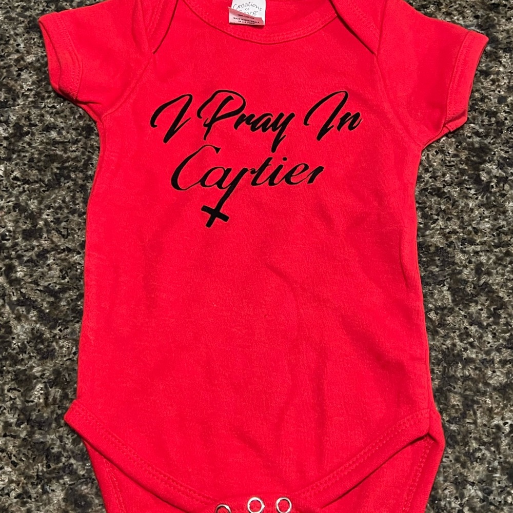 I Pray In Cartier baby onesie